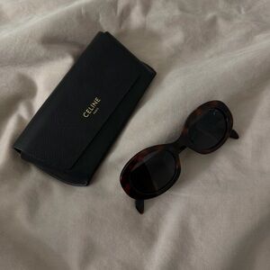 Celine Triomphe oval-frame tortoiseshell acetate sunglasses